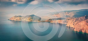 Panoramic spring view of Asos peninsula and town. Dramatic morning seascape of Ionian Sea