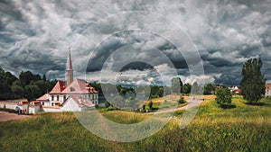 Panoramic summer cloudy landscape with a Priory Palace in Gatchina. Russia