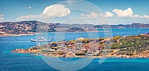 Panoramic summer view of Palau town, Province of Olbia-Tempio, Italy, Europe. Sunny morning view of Sardinia island. Picturesque s photo