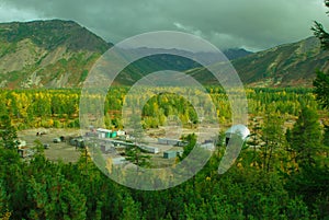Panoramic summer view of worker s camp in taiga in early morning with fresh air