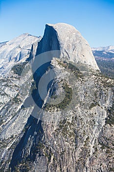 Panoramic summer view of Yosemite valley with Half Dome mountain, Tenaya Canyon, Liberty Cap, Vernal Fall and Nevada Fall, seen