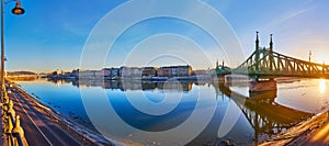 Panoramic sunrise cityscape with Danube River and Liberty Bridge, Budapest, Hungary