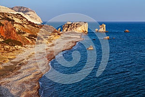 Panoramic sunset landscape of Petra tou Romiou (The rock of the Greek), Aphrodite& 39;s legendary birthplace in Paphos, Cyprus photo