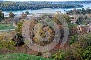 Panoramic sunset view of Belgrade Fortress, Kalemegdan Park, Sava and Danube Rivers in city.