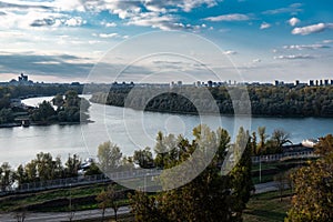 Panoramic sunset view of Belgrade Fortress, Kalemegdan Park, Sava and Danube Rivers in city.