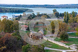 Panoramic sunset view of Belgrade Fortress, Kalemegdan Park, Sava and Danube Rivers in city.