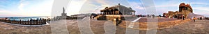 Panoramic sunset view of Kanyakumari beach, Vivekananda memorial and statue photo