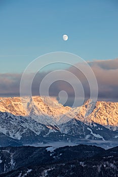 Panoramic sunset view moon Saalbach skiing Mountain moonrise dark mood