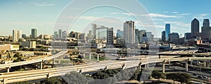 Panoramic top view Dallas expressway viaduct and modern downtown skylines