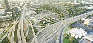 Panoramic top view elevated highway stack interchange and Houston skylines