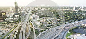 Panoramic top view elevated highway stack interchange and Houston skylines