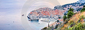 Panoramic top view of the Old Town of Dubrovnik, banner, panorama in beautiful evening light at sunset