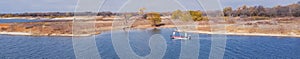 Panoramic top view two anglers fishing from motor boat at Murrell Park, Lake Grapevine, Texas, USA