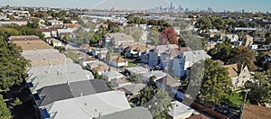 Panoramic top view typical residential neighborhood with downtown Chicago in background