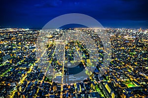 Panoramic urban city skyline aerial view under twilight sky and neon night in tokyo, Japan