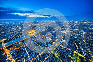 Panoramic urban city skyline aerial view under twilight sky and neon night in tokyo, Japan