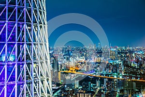 Panoramic urban city skyline aerial view under twilight sky and neon night in tokyo, Japan