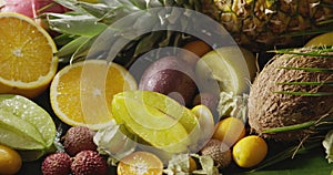 Panoramic video healthy fresh tropical fruits background with pouring water. Motion, 4K UHD video, 3840, 2160p. Concept