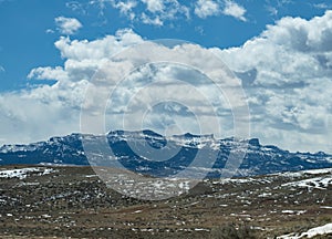 Panoramic view of Absaroka mountain range, a subrange of the Rockies. Landscape view from Cody, Wyoming.