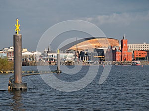 A panoramic view across Cardiff Bay in Wales, UK, on a sunny day.