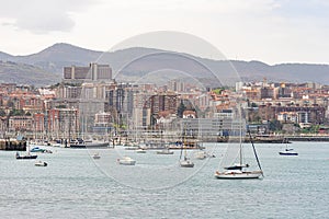 panoramic view across the sea to the city of Santurce-Basque country-Spain. photo