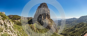 Panoramic view of Agando rock in La Gomera island. A volcanic plug, also called a volcanic neck or lava neck, is a volcanic object photo