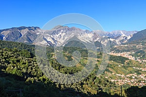 Panoramic view of Alpi Apuane mountain chain in Tuscany, Italy photo