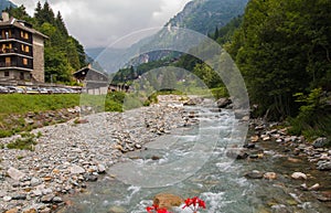 Panoramic view of alpine river in the famous center of Alagna in Valsesia Italy photo