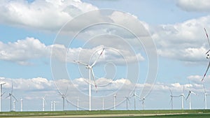 Panoramic view on alternative energy wind mills in a windpark in northern europe