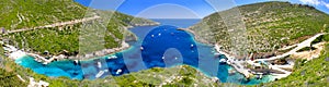 Panoramic view on amazing bay, boats and ships with swimming people in Ionian Sea blue water near to Blue Caves. Zakynthos island