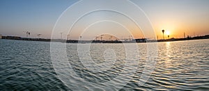 Panoramic view on amazing sunset on Beer Sheva lake - handmade lake in Israel