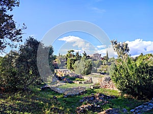 Panoramic view of the Ancient Agora of Athens in Greece with the Temple of Hephaestus in the distance.