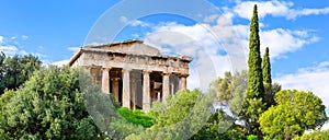 Panoramic view of ancient greek temple of Hephaestus against blue sky background in Agora in Athens center, Greece