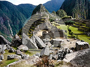 Panoramic view of the ancient Inca city of Machu Picchu and its characteristic stone houses