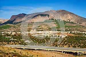 Panoramic view of the Andalusian white village next to the high mountains that surround it, Velez Rubio, Almeria. photo