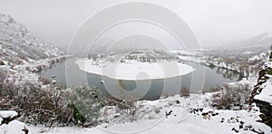 Panoramic view of Arda river in Rodopi Mountains. Kardzali province, Bulgaria, in snowy winter day