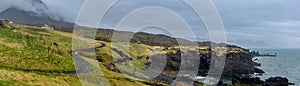 Panoramic view of Arnarstapi landscape in Selflessness peninsula, Iceland photo