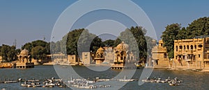 Panoramic view of artistically carved historic temples and shrines around The Lake Gadisar Jaisalmer.India photo