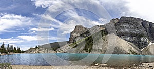 Panoramic view of azure blue coloured lake and mountains at Moraine Lake, Rocky Mountains, Alberta, Canada