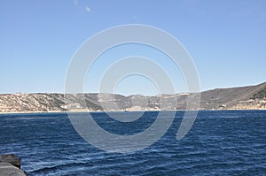 Panoramic view of Bakar city with rough Adriatic sea in Croatia.Rough Adriatic Sea and Bura wind in Bakar gulf.