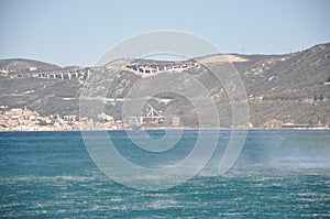 Panoramic view of Bakar city with rough Adriatic sea in Croatia.Rough Adriatic Sea and Bura wind in Bakar gulf.