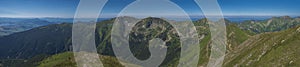 Panoramic view from Baranec peak on Western Tatra mountains or Rohace panorama. Sharp green mountains - ostry rohac