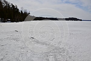 Panoramic view of Bass Lake frozen over with ice