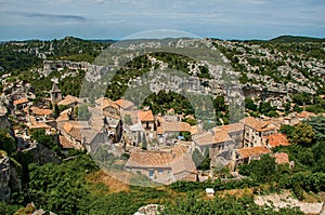 Panoramic view of the Baux-de-Provence castle ruins on the hill.