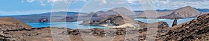 Panoramic view of the bay of Bartolome island seen from the top of the volcano near the beach