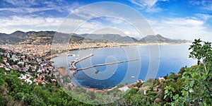 Panoramic view of the bay of the Mediterranean Sea and cityscape with the old historic tower, Alanya, Turkey