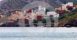 Panoramic view of beach and old houses photo