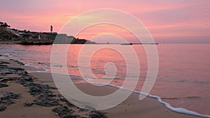 Panoramic view of beach Ras Umm El Sid. Beautiful sunrise over Red Sea with rocky shores, sandy beach with first rays of