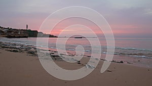 Panoramic view of beach Ras Umm El Sid. Beautiful sunrise over Red Sea with rocky shores, sandy beach with first rays of