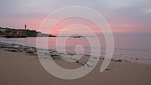 Panoramic view of beach Ras Umm El Sid. Beautiful sunrise over Red Sea with rocky shores, sandy beach with first rays of